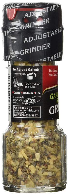 Seasoning being sprinkled on roasted vegetables for vibrant color