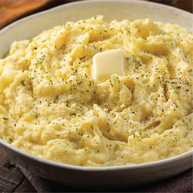 Measuring spoon shows precise garlic seasoning control with McCormick.