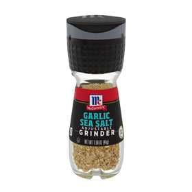 McCormick Garlic Sea Salt Grinder pour action, adjustable grind for seasoning.