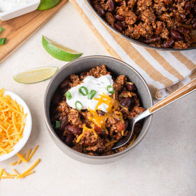 McCormick Gluten Free Chili Seasoning Mix served with toppings like cheese