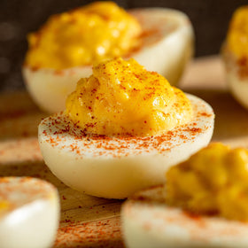 McCormick Gourmet Smoked Paprika enhances paella with authentic color and depth.