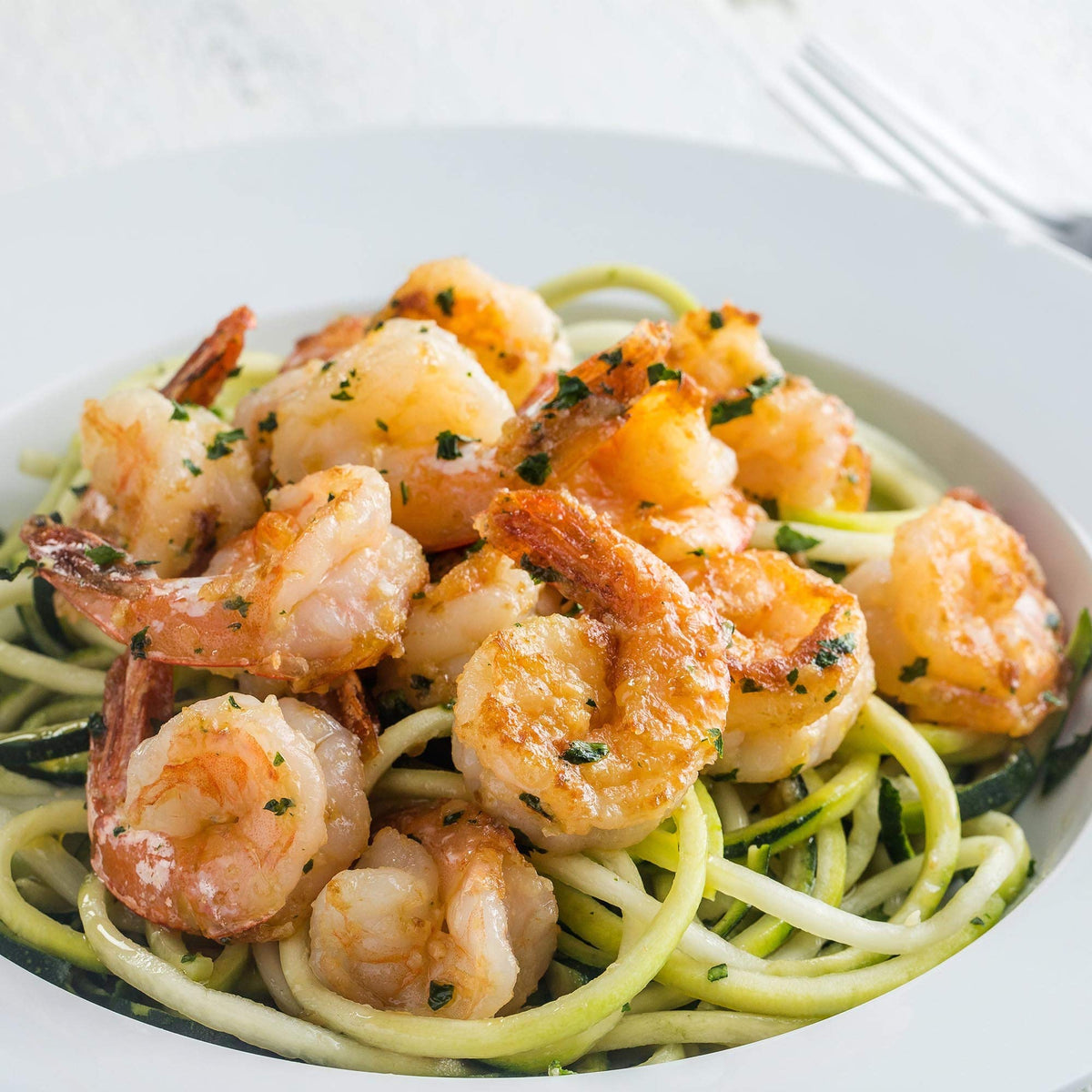 Marinade base shot suggests easy flavor layering for seafood and vegetables.