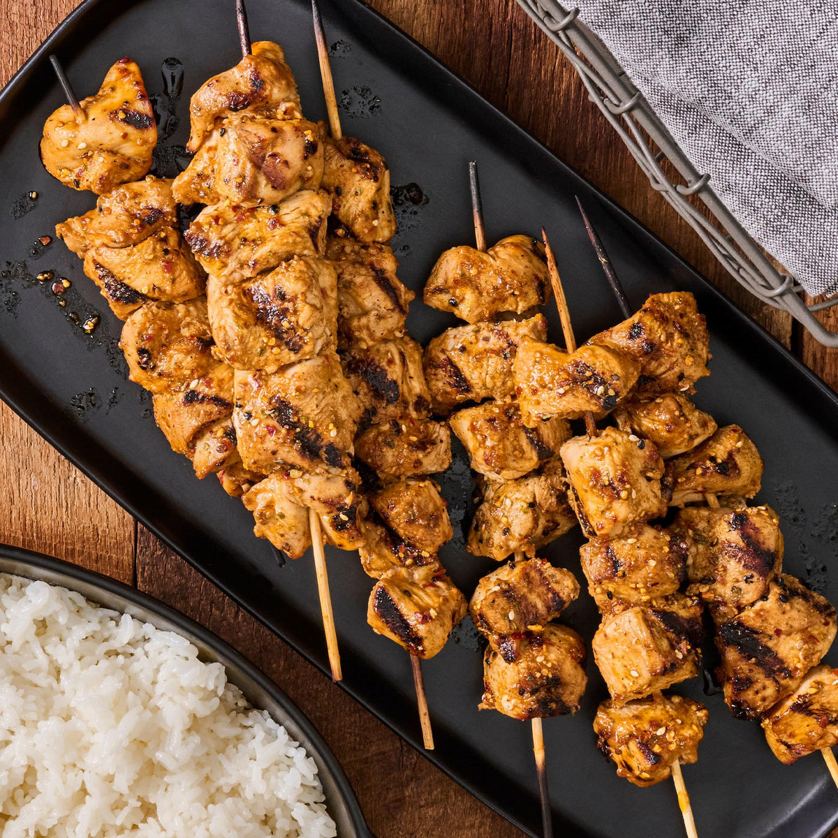 McCormick Grill Mates Asian BBQ marinating meat image suggests versatile use.
