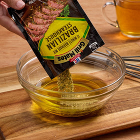 McCormick Grill Mates Brazilian Steakhouse Seasoning label closeup shows pepper, parsley, garlic notes