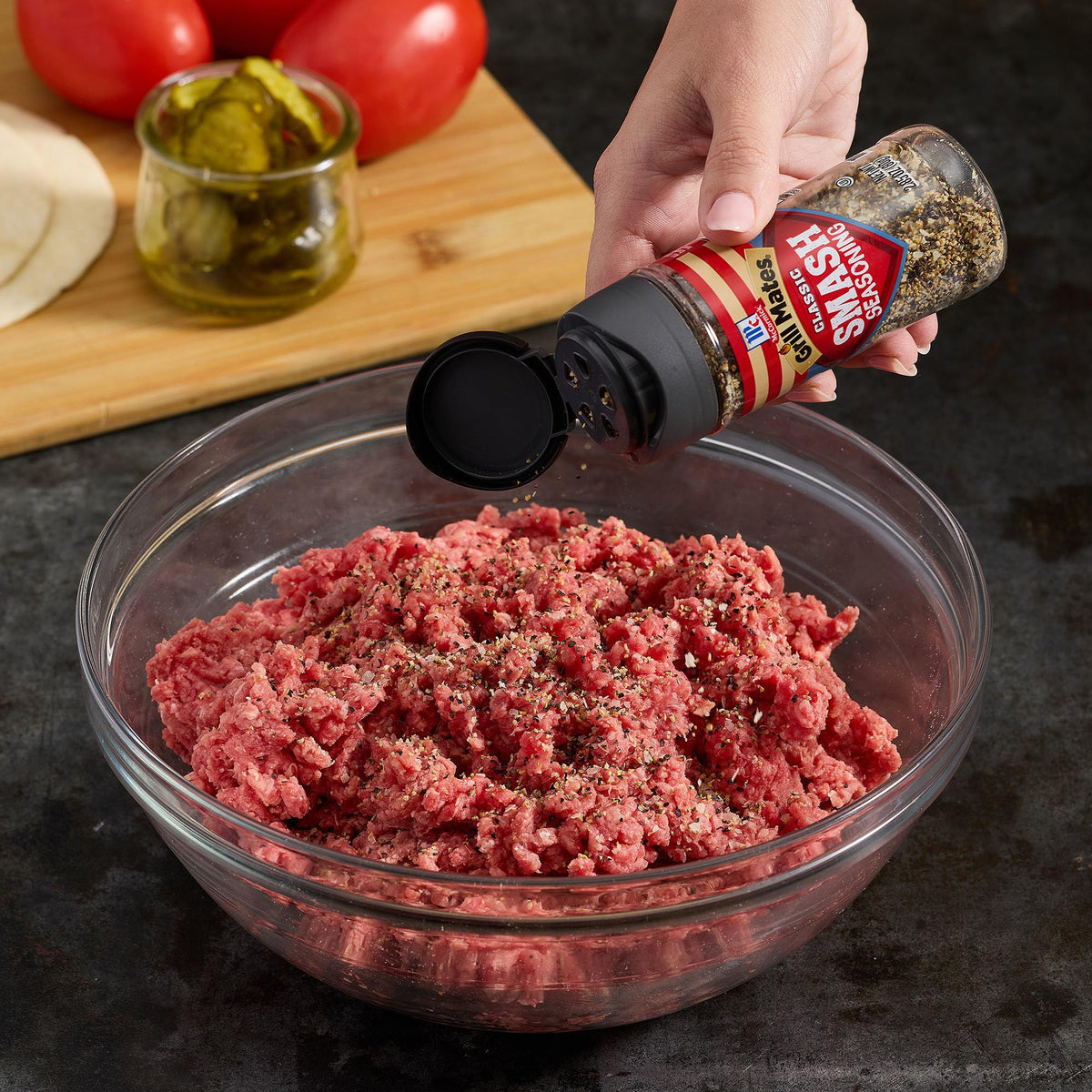 McCormick Grill Mates Classic Smash pan-sizzle over hot grill