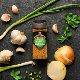 Family dinner scene featuring McCormick Garden Vegetable Seasoning flavor boost