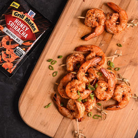 McCormick Grill Mates Honey Sriracha Marinade with pork tenderloin for glaze-ready finish.