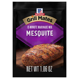 McCormick Grill Mates Mesquite Marinade bottle closeup highlighting smoky flavor boost.