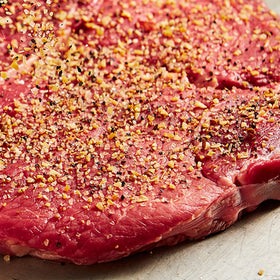 McCormick Grill Mates Montreal Seasoning on ribs for bold, zesty touch