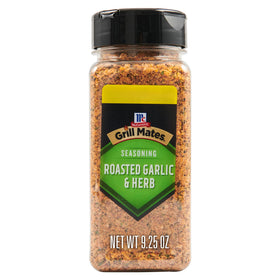 McCormick Grill Mates roasted garlic and herb bottle pour in use