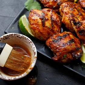 Grilled chicken glazed with McCormick Smokehouse Mesquite flavor for bold aroma.
