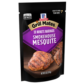 Tear and pour action showing McCormick Smokehouse Mesquite pouch for easy marination.