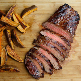 Finished grilled meal showcasing McCormick Smokehouse Mesquite flavor.