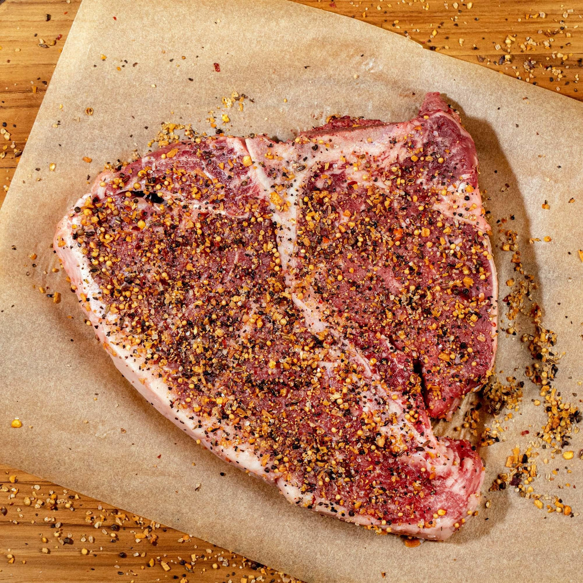 McCormick Montreal spice bottle beside tongs signals quick, flavorful grilling