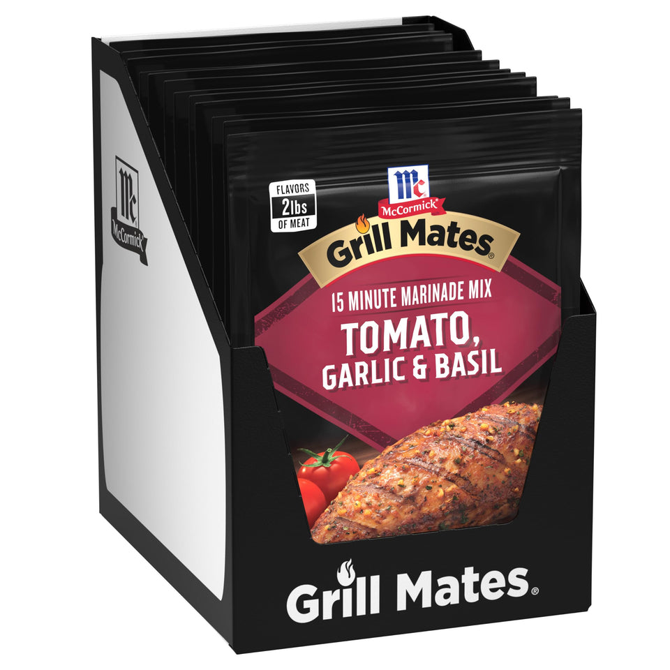 McCormick Grill Mates Tomato Garlic Basil Marinade bottle boosts juicy chicken flavor