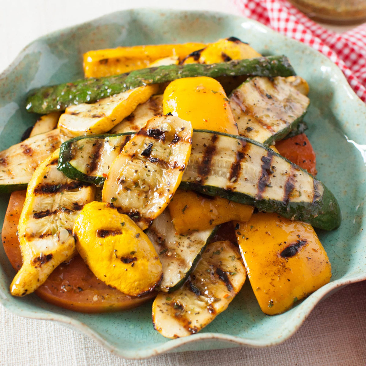 Chicken on the grill with McCormick Zesty Herb Marinade.