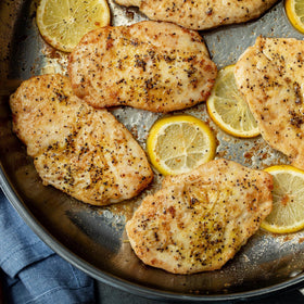 McCormick lemon pepper sprinkled over a fresh salad.