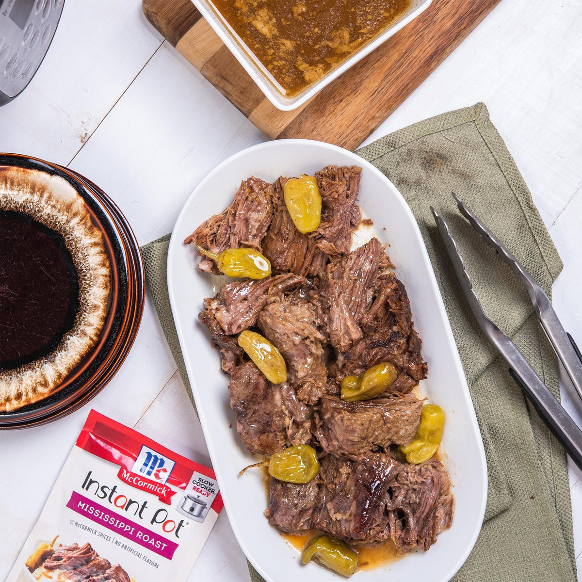 Serving plate with tender beef flavored by McCormick mix.