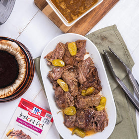 Serving plate with tender beef flavored by McCormick mix.
