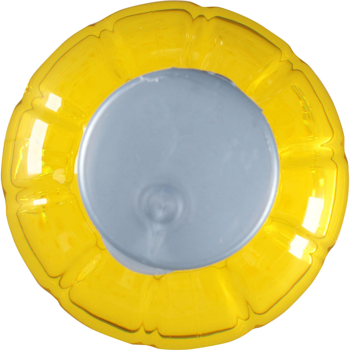 Pour-cap dispensing demonstrated for quick flavor bursts in recipes.