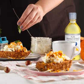Dessert-ready image showing sorbet or glaze flavored with McCormick Orange Extract.