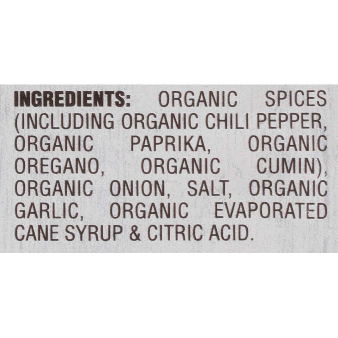 Pouring McCormick Organics taco seasoning for precise, customizable spice