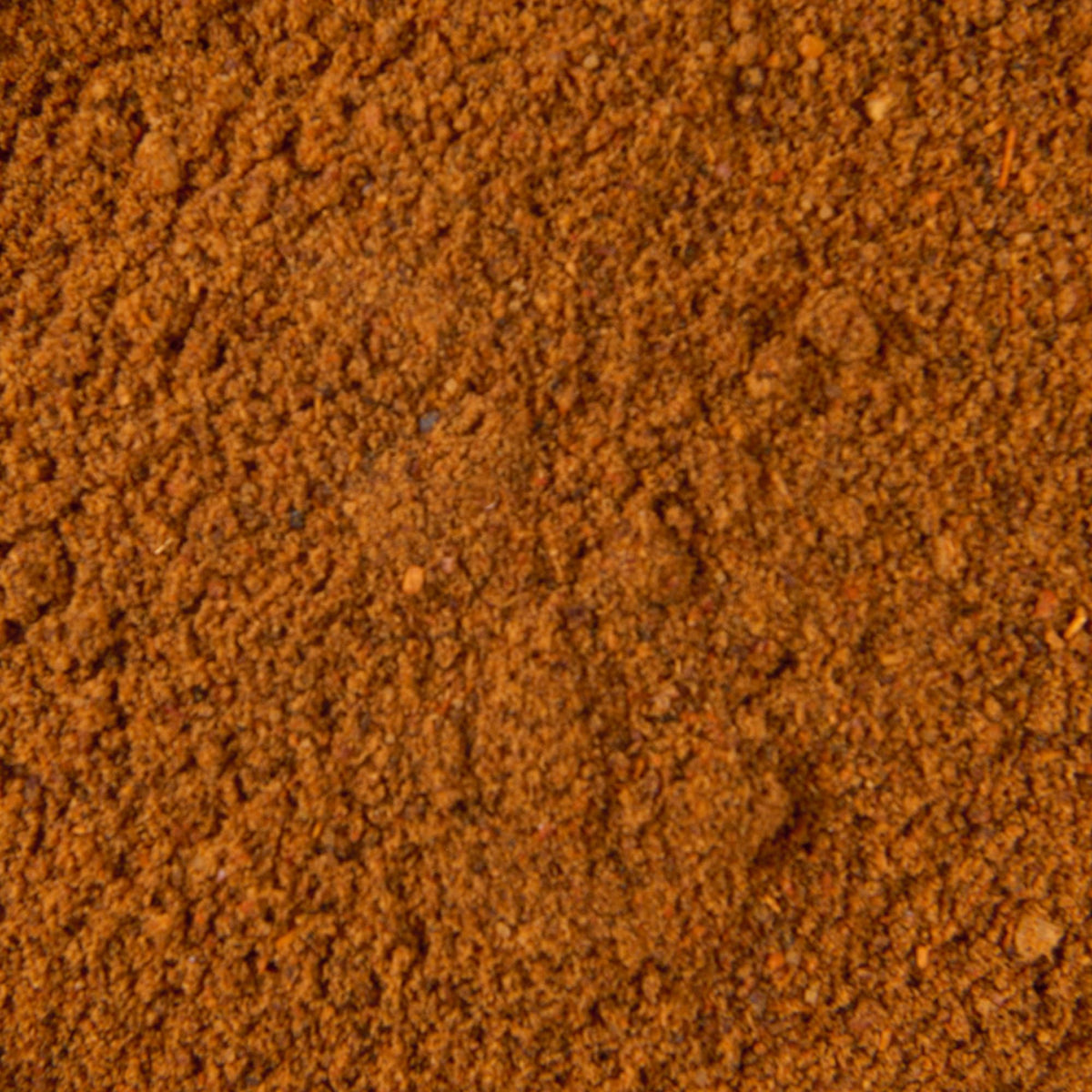 Serving bowl of chili finished with McCormick mix, perfect for gatherings