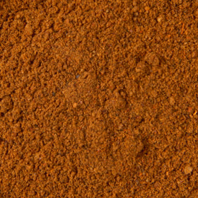 Serving bowl of chili finished with McCormick mix, perfect for gatherings