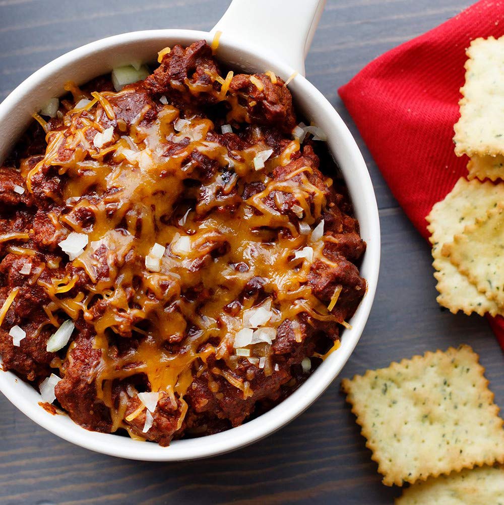 Stovetop scene with chili simmering, inviting aroma and texture