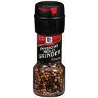 Close-up of the spice blend featuring black, white, pink peppercorns