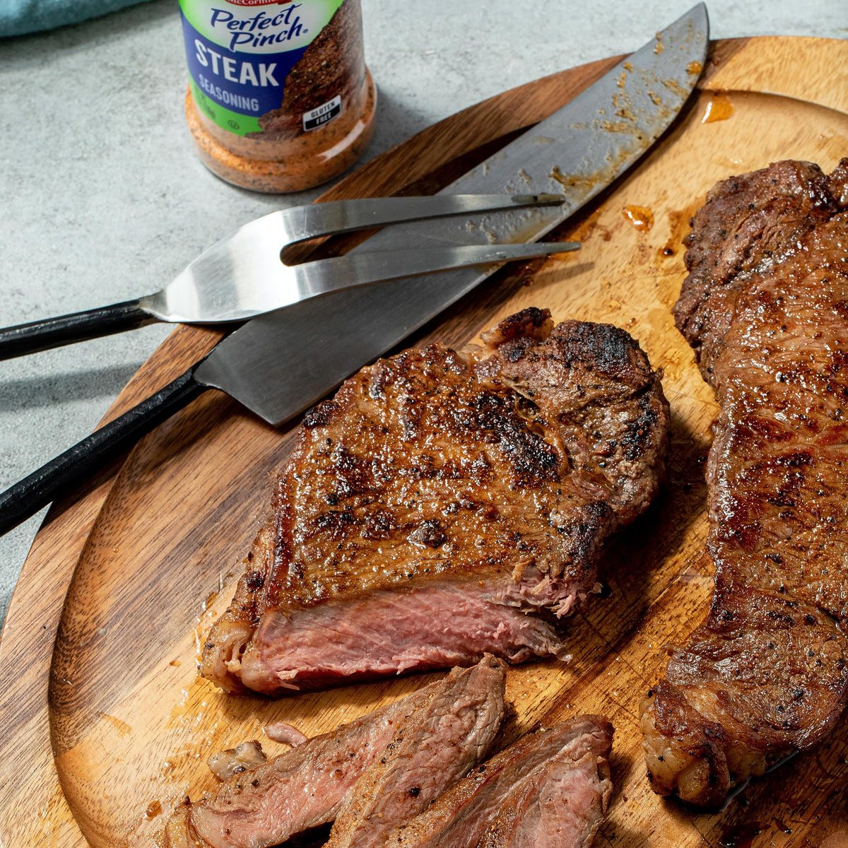 McCormick Perfect Pinch Steak Seasoning on pan-fried steak delivers savory crust.