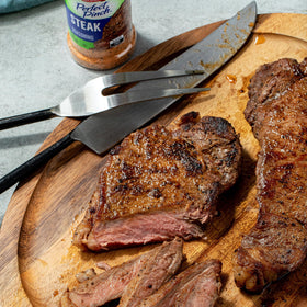McCormick Perfect Pinch Steak Seasoning on pan-fried steak delivers savory crust.