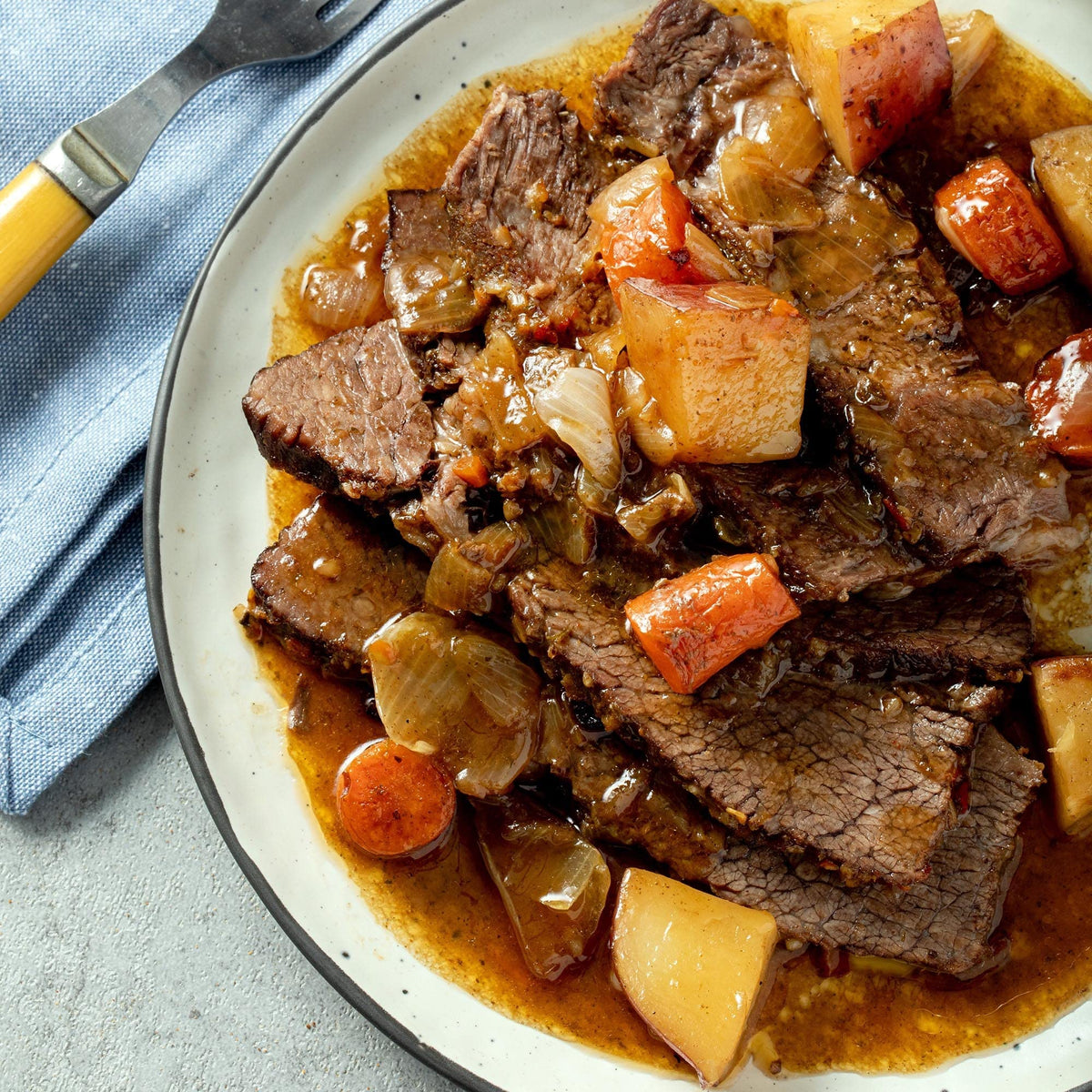 McCormick Pot Roast Seasoning Mix close-up showing herbs for savory, comforting dinners.