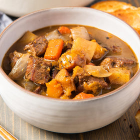McCormick Poultry Gravy Mix spoon-dipping boosts flavor with pan drippings option.