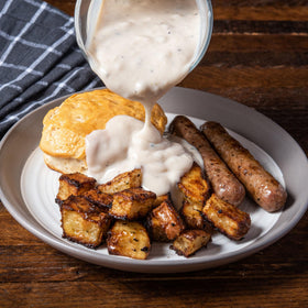 McCormick Sausage Country Gravy Mix in saucepan, quick 2-cup gravy ready.