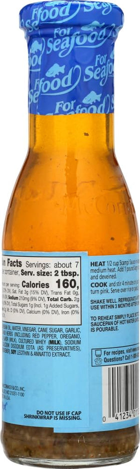 Jar of McCormick Scampi sauce with visible red pepper, oregano, and basil for bright taste.