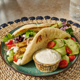 Finished shawarma pita ready to serve.