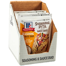 McCormick Shawarma Pita seasoning kit with garlic sauce for quick weeknight meals.