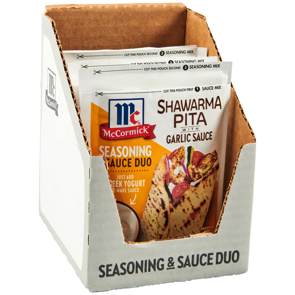 McCormick Shawarma Pita seasoning kit with garlic sauce for quick weeknight meals.
