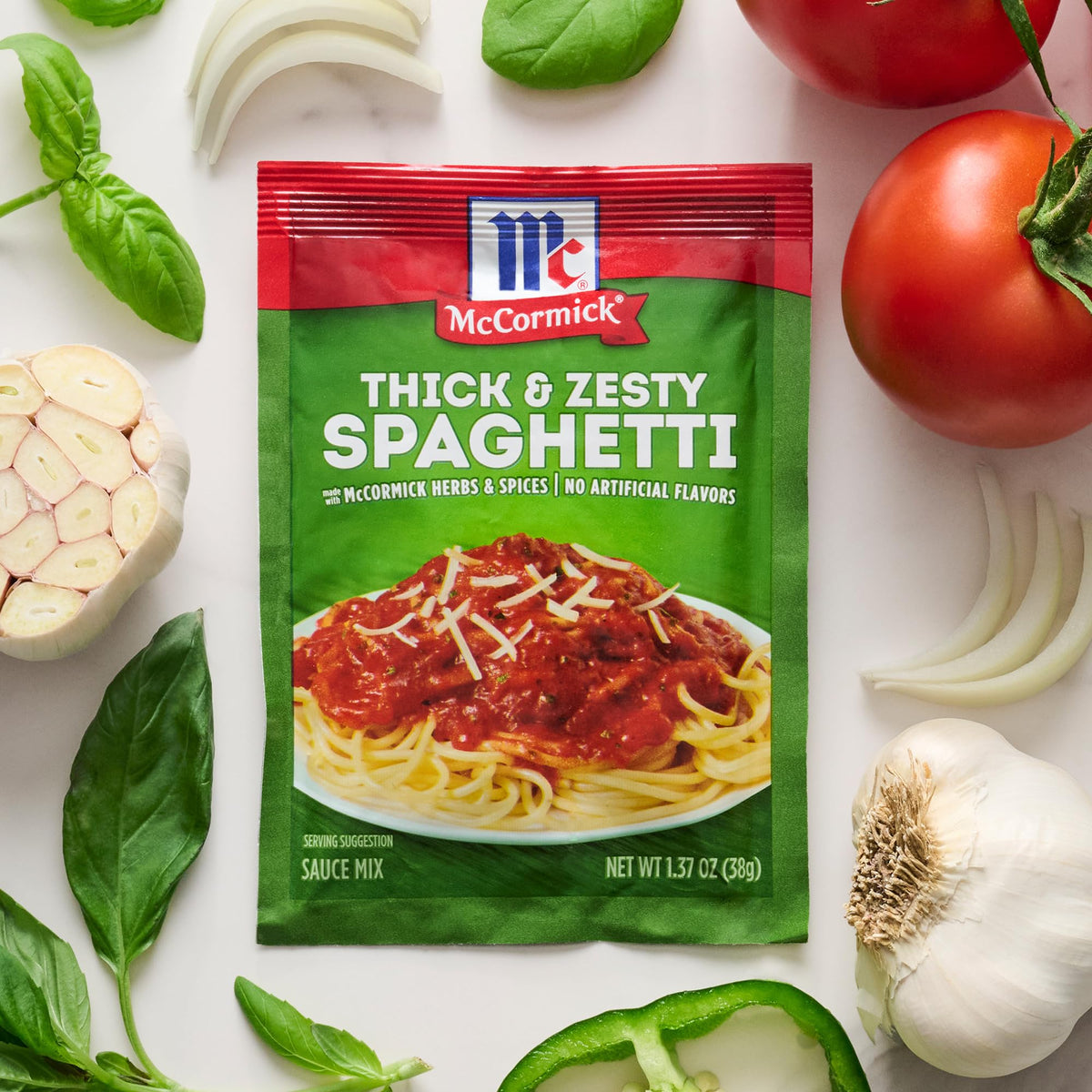 McCormick kitchen scene with spices and spaghetti sauce setup