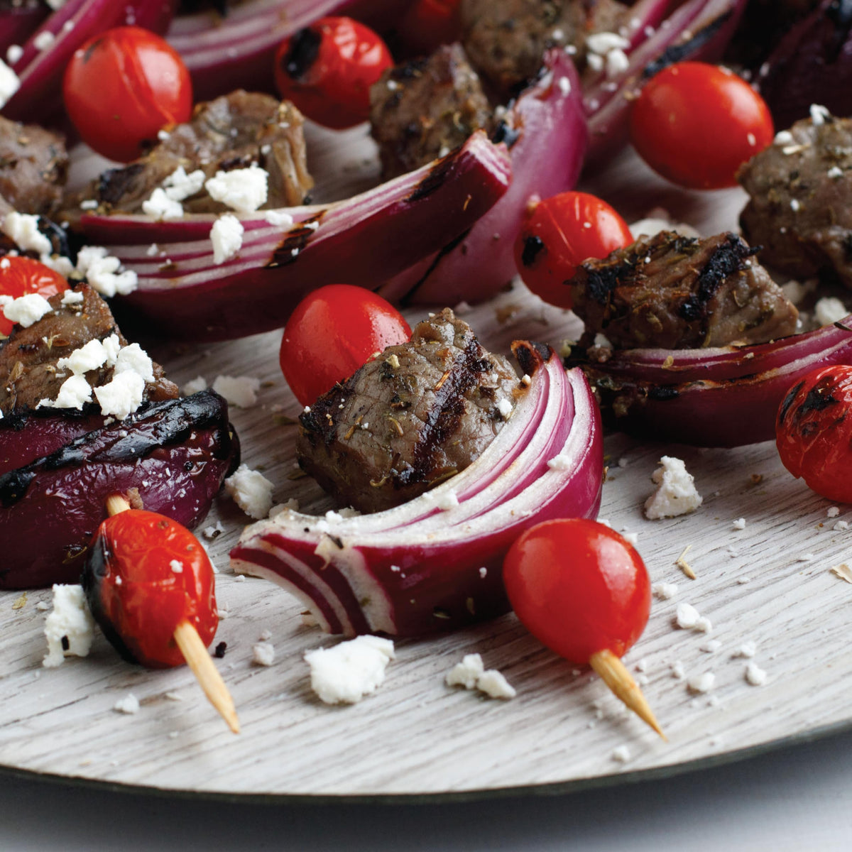 Table-side sprinkle of McCormick pepper enhancing salads and potatoes