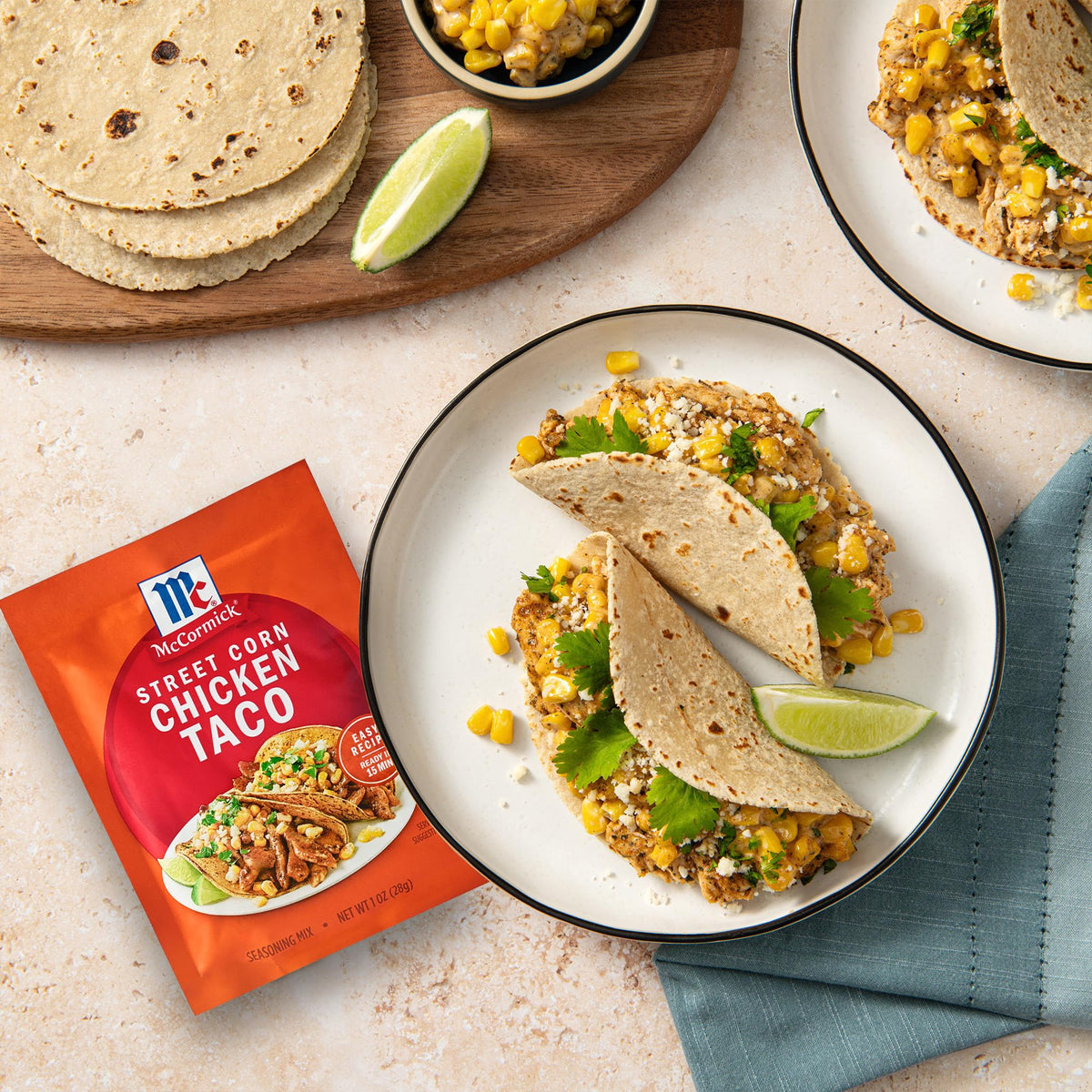 Taco assembly features Cotija and cilantro with McCormick seasoning.