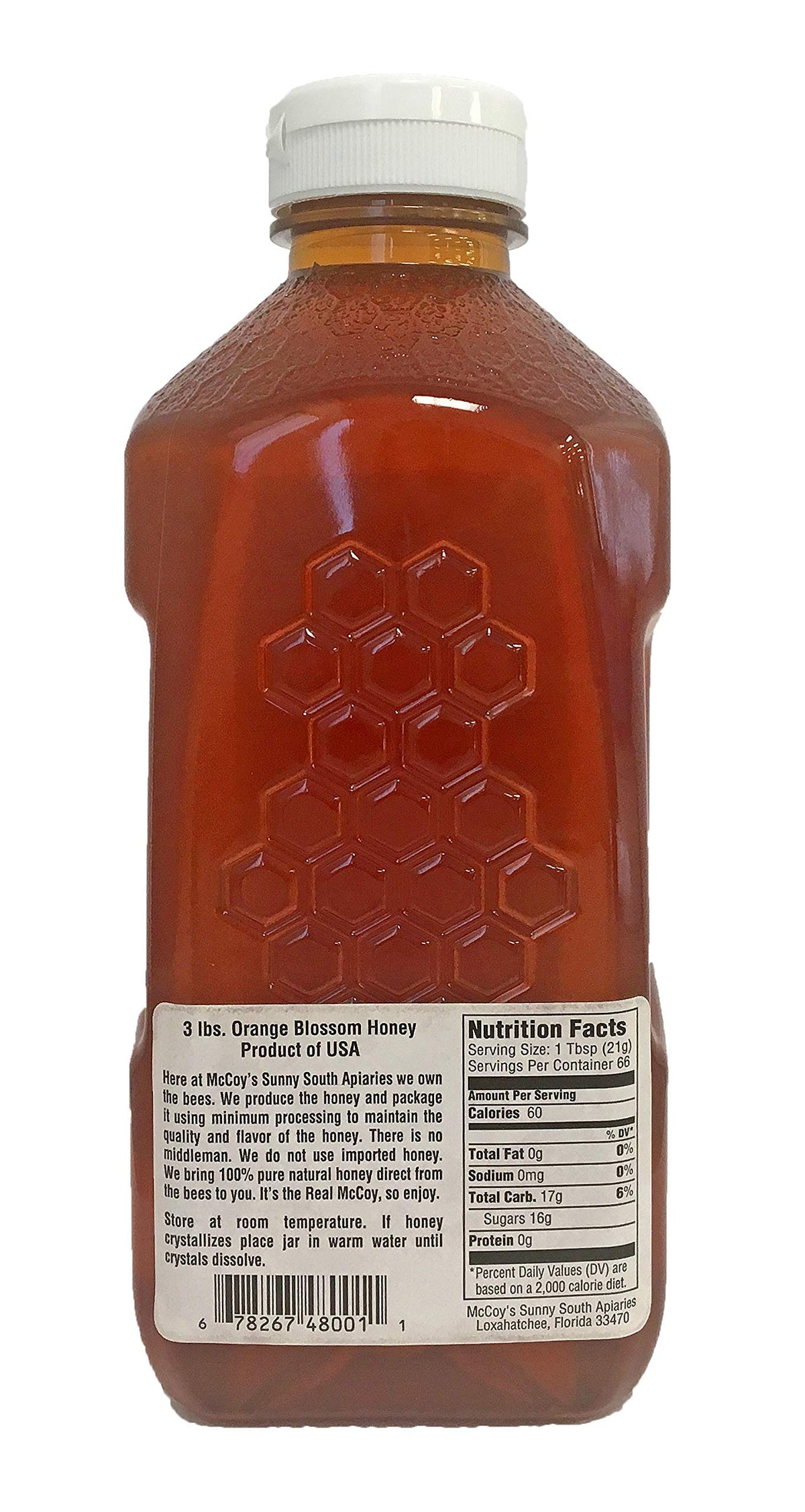 McCoy's Honey Orange Blossom pour in a glass bottle, ideal for tea and yogurt.