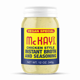 McKay’s Vegan Chicken Seasoning bottle pouring into a pot for savory soups