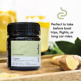 me today Digest Manuka honey jar closeup highlighting ginger-turmeric infusion for warmth.