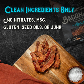 MEAT ARTISAN bacon jerky plated with cheese for gourmet snacking