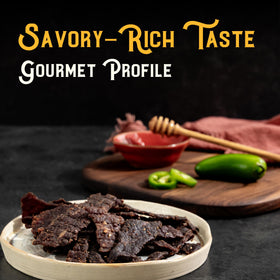 Meat Artisan Wagyu honey jalapeno jerky closeup highlights glossy texture and bold flavor.