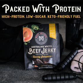 Meat Artisan Wagyu jerky glistening slices showcase premium flavor and portability.