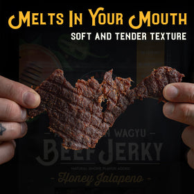 Meat Artisan Wagyu jerky texture detail reveals marbled beef and savory juiciness.