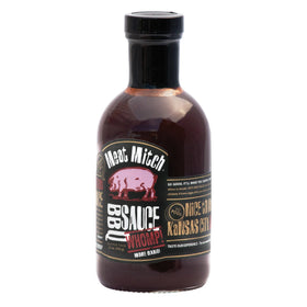 Meat Mitch Whomp! BBQ Sauce bottle ready for glaze on ribs